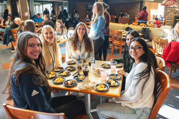 Students enjoying authentic flavors